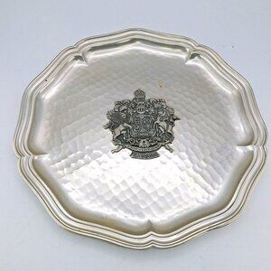 Vintage 10" diam. pressed metal souvenir plate w/ Decortive Canada coat of arms